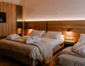 Armon Greenblu Hotel-wellnes v stredisku Folgarida - záber na manželskú posteľ z boku
