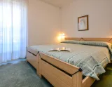 Hotel Splendor v stredisku Folgarida-Marilleva - pohľad na manželskú posteľ
